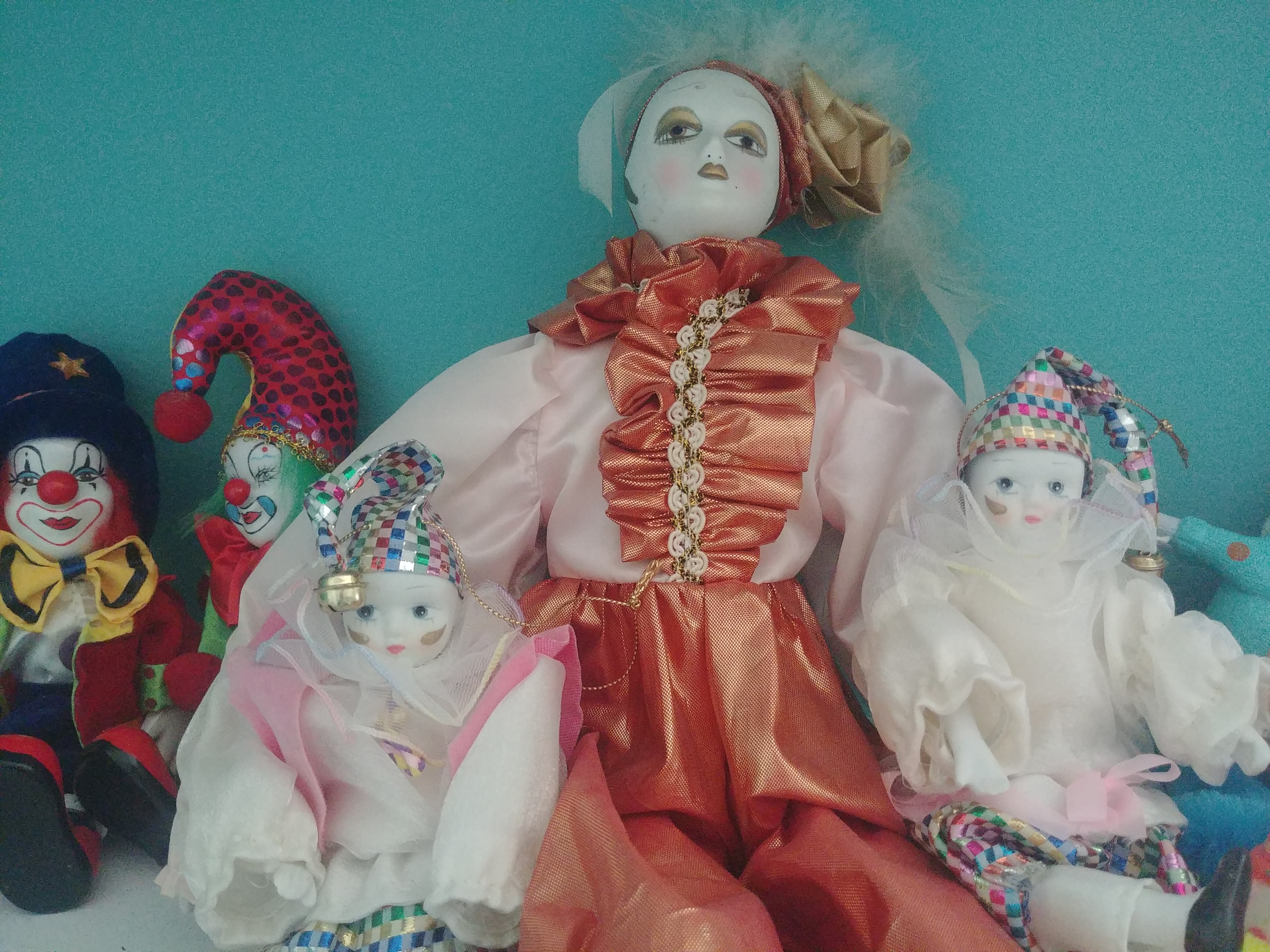 three clown dolls
